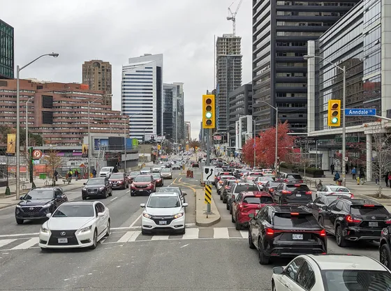 Looking north on Yonge Street at Sheppard Avenue in North York, with condo and office towers on both sides.